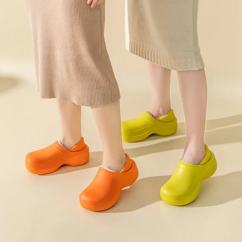 Two women wearing orange and yellow shoes