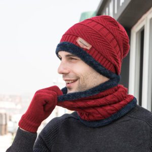 A man wearing a red hat and scarf.