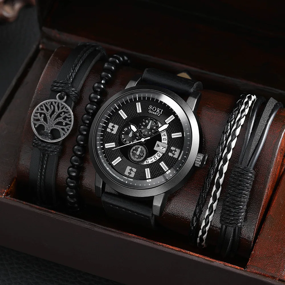 A watch and bracelet set in a box.