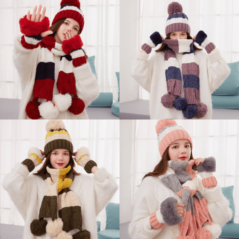 A group of four women wearing winter hats and gloves.