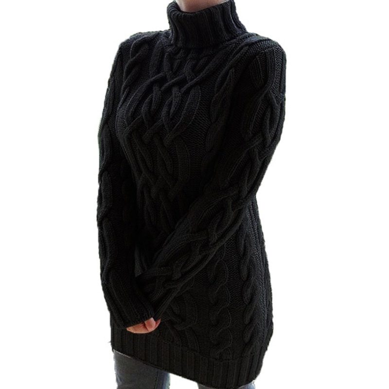 A woman wearing black sweater standing in front of the camera.