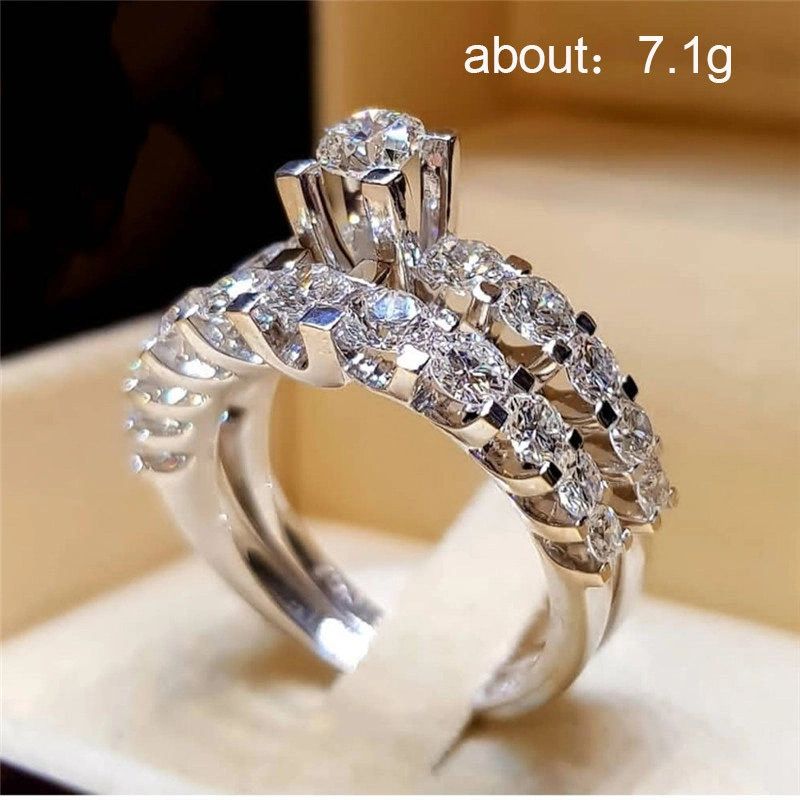 A diamond ring is shown with the caption " about : 7. 1 g ".