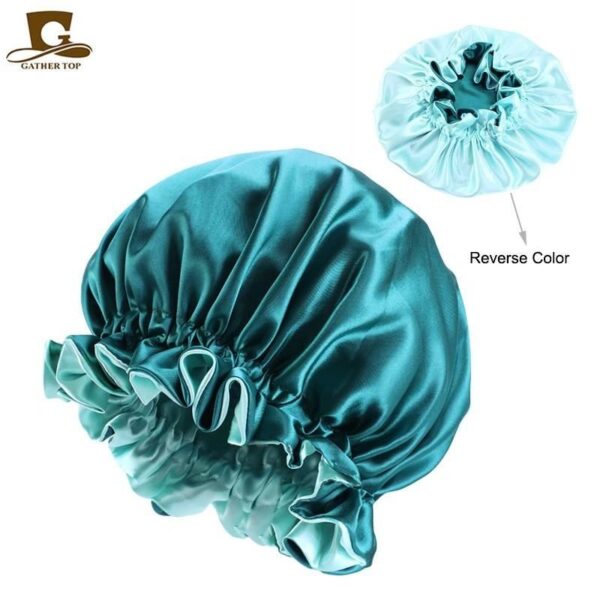 A blue satin shower cap is shown next to the reverse color.