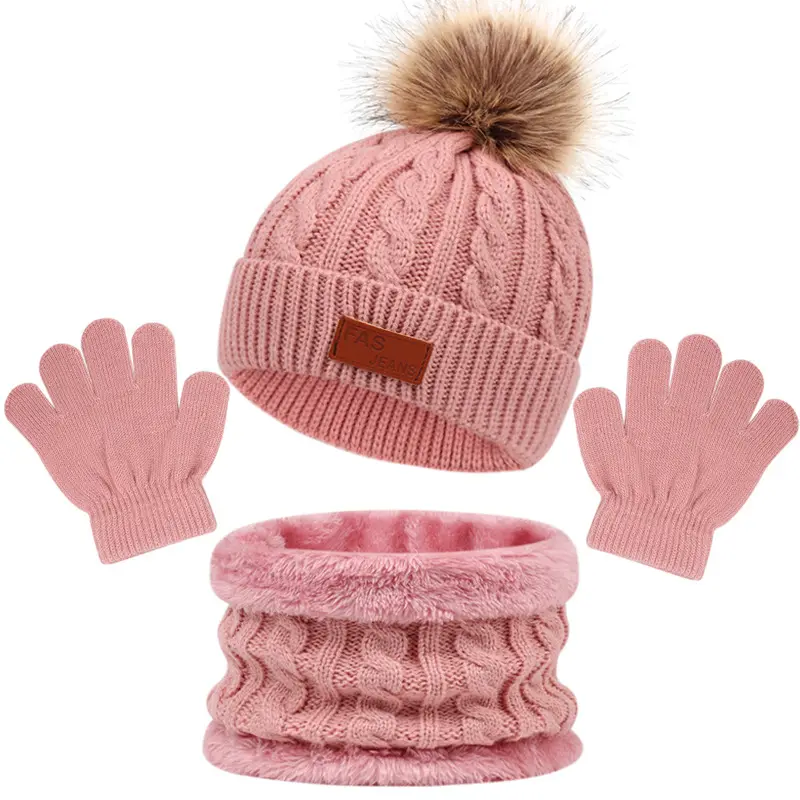 A pink hat, scarf and gloves set.